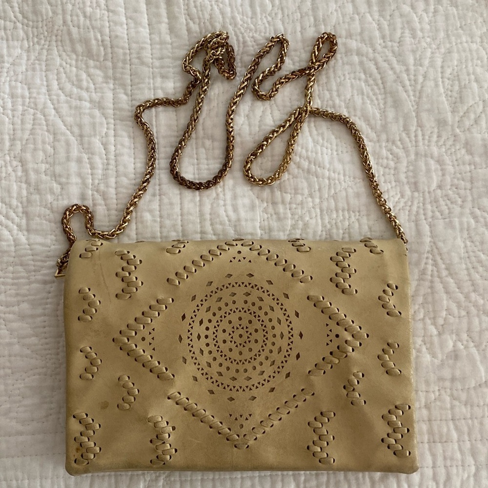 Free People clutch with removable gold strap